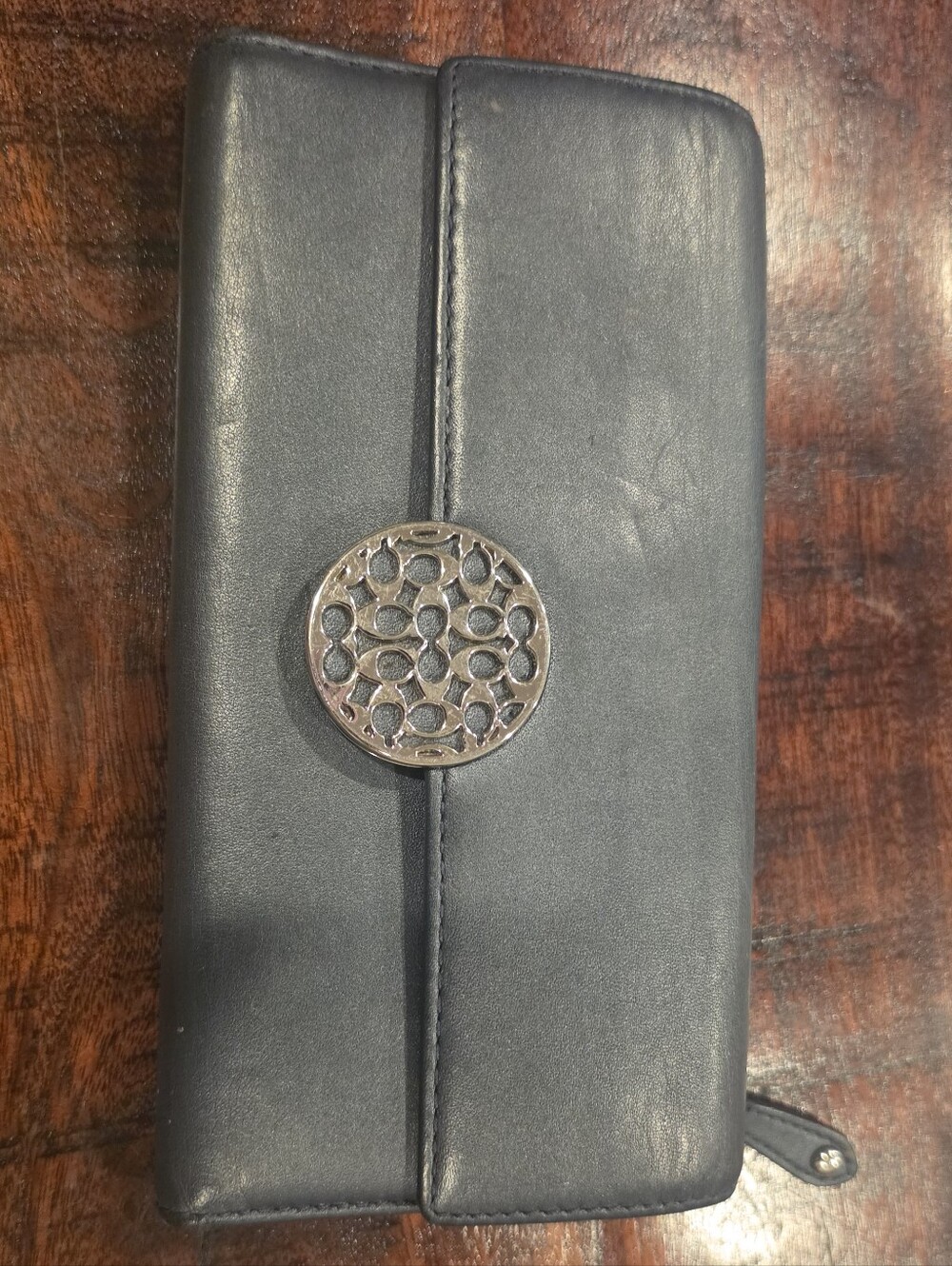 Coach Black Leather Wallet with Silver Accent Medallion
